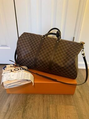 Authentic Louis Vuitton Keepall Bandoulière 55 duffle bag in Damier Ebène